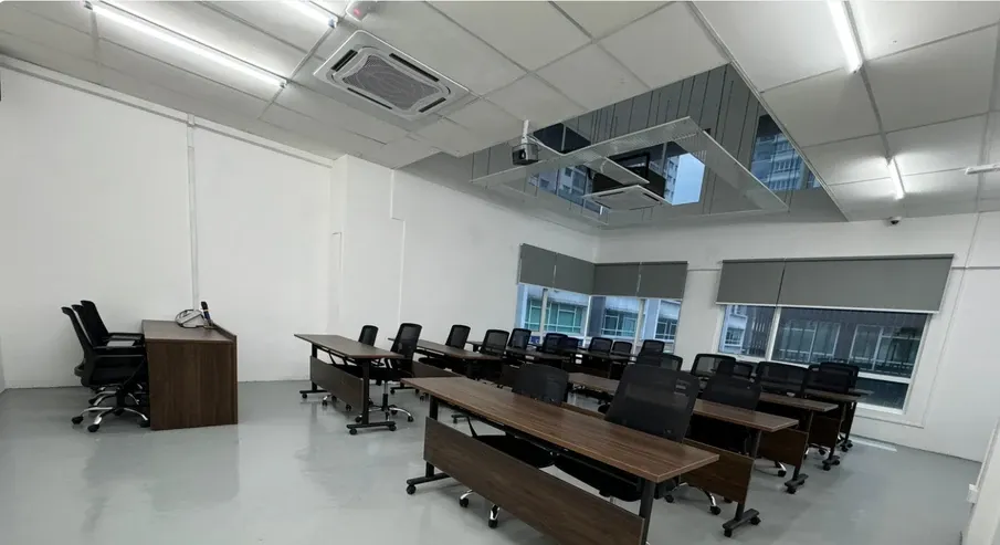 A fitted-out meeting room with new ceiling, lighting and partitions
